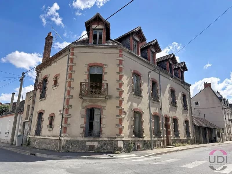 Immeuble de rapport de caractère avec 6 appartements, 5 garages et jardin - Photo 1