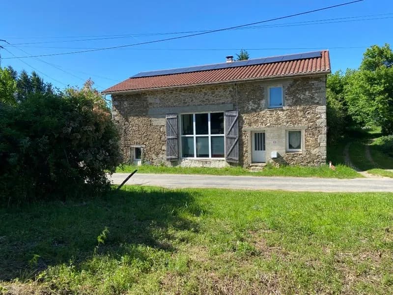 Ensemble immobilier en pierre composé d'une habitation et d'une dépendance à usage de garage - Photo 1