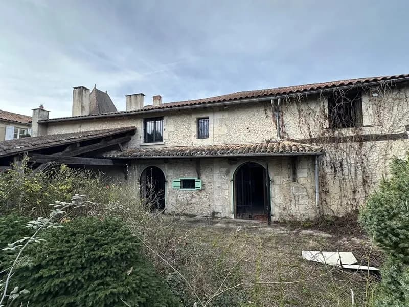 Ancien commerce à vendre, avec possibilités de faire des appartements - Photo 1