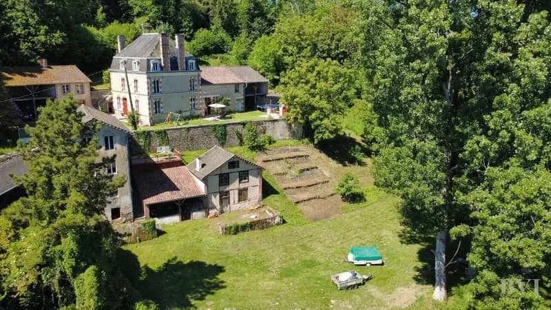 Magnifique ensemble immobilier au bord de la rivière avec revenu potentiel - Photo 1