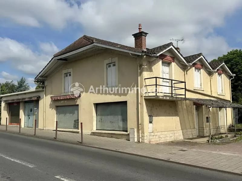 Ensemble immobilier avec local commercial, habitation et garages - Idéal investisseur - Photo 1