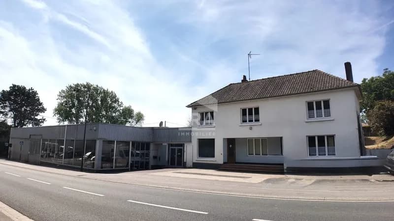 Ensemble immobilier : habitation + local professionnel sur 852 m² - Photo 1