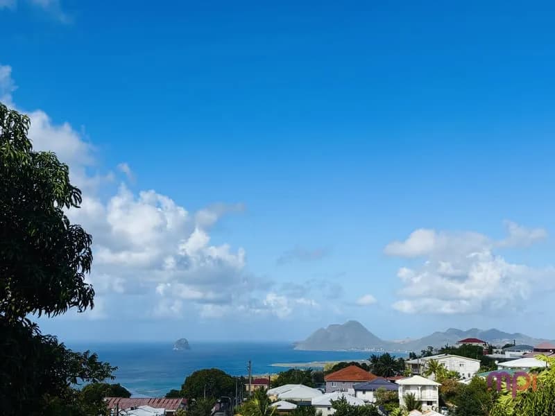 ENSEMBLE IMMOBILIER A RENOVER VUE MER A 180o - Photo 1