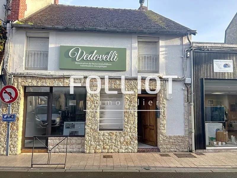 IMMEUBLE CENTRE VIILLE avec Maison et boutique - Photo 1
