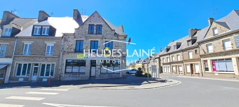 Immeuble BARENTON - Commerce et deux appartements - Photo 1