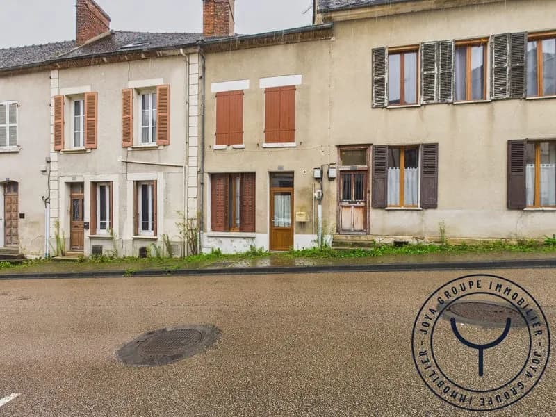 Immeuble avec studio, T4 et combles aménageables 59 000€ - Photo 1