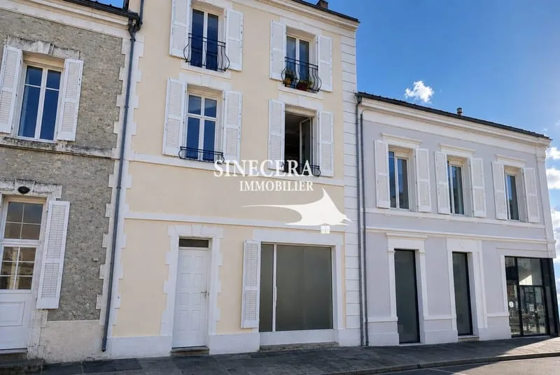 Immeuble avec local commercial et 3 appartements. - Photo 1