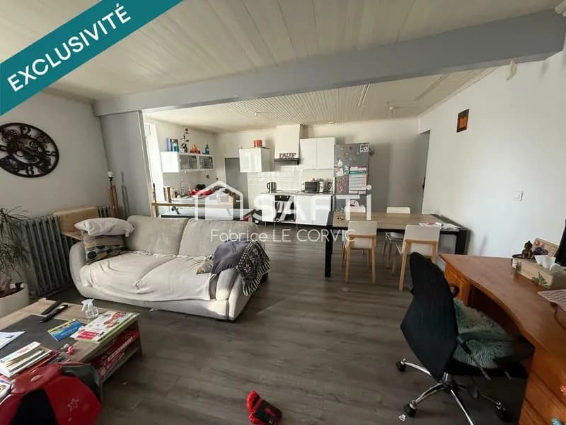 IMMEUBLE DE RAPPORT AVEC 3 LOGEMENTS ET UN JARDIN - Photo 1