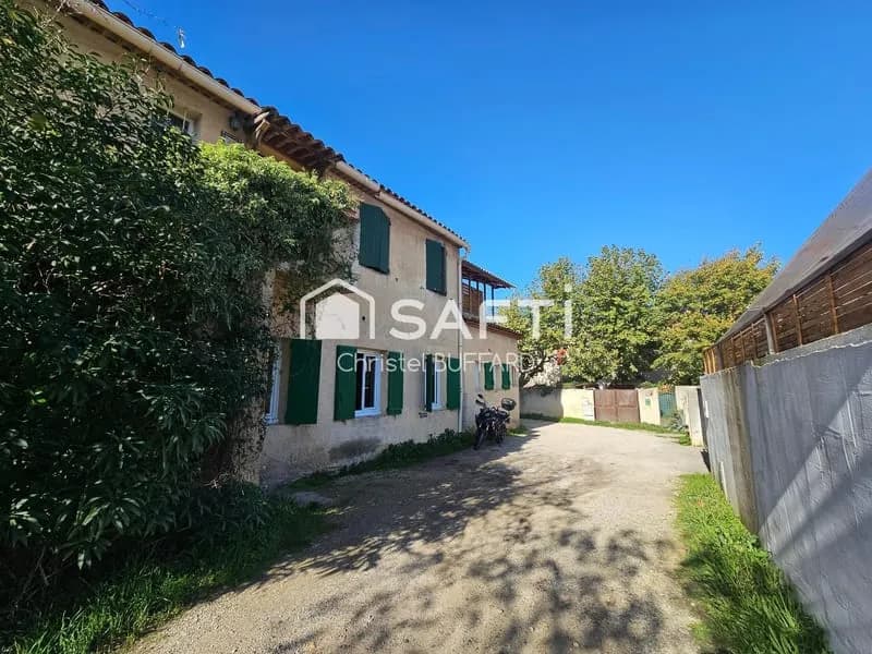 Petit immeuble à fort potentiel avec terrain constructible - Photo 1
