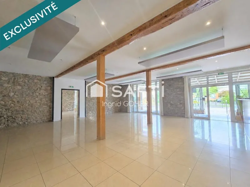 IMMEUBLE DE RAPPORT-COMMERCE, HABITATION, GARAGES - Photo 1