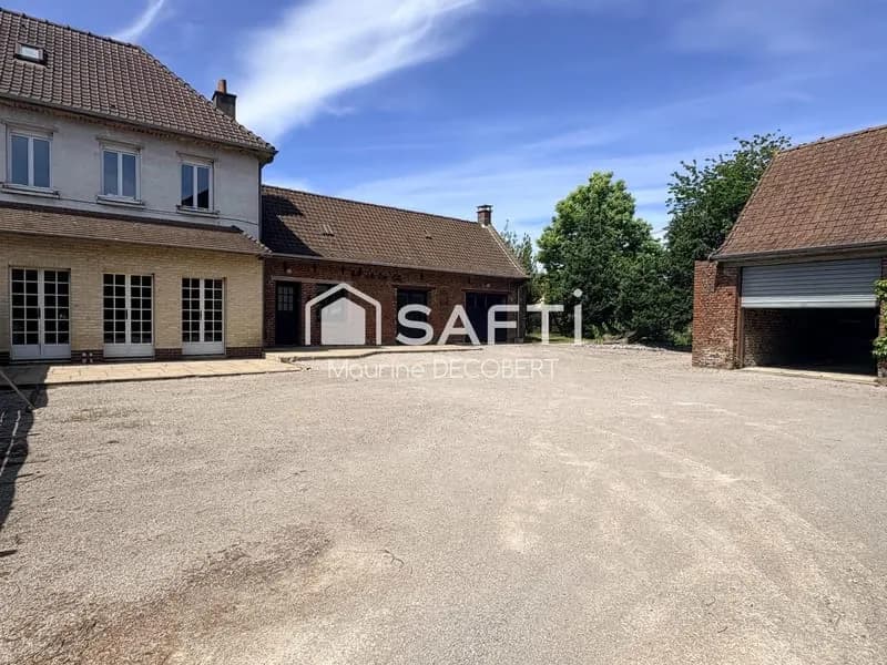Ensemble immobilier composé d'une maison et d'un local commercial - Photo 1