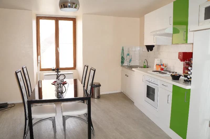 Immeuble de 250m² loué avec 2 T3 de 72m² et 2 T2 de 56m2 et 50m² - Photo 1