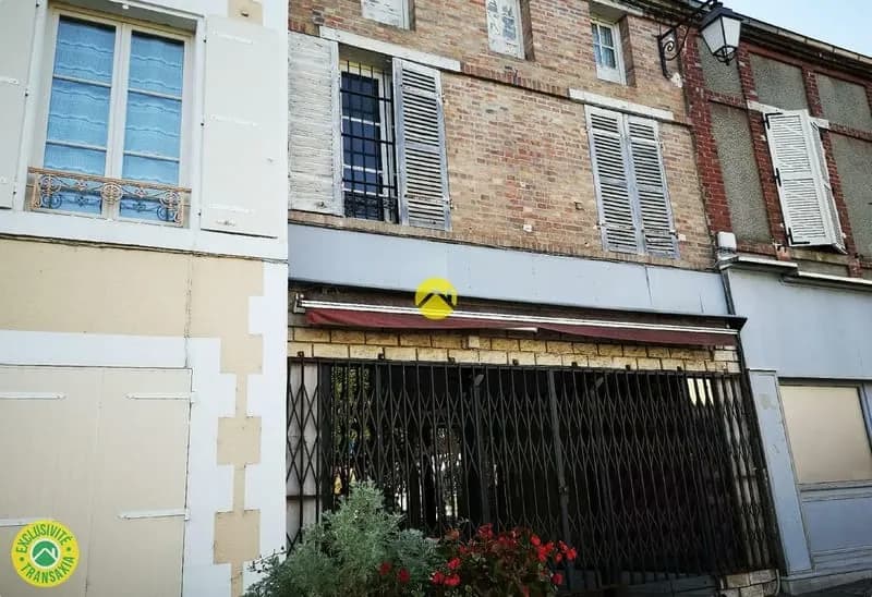 Immeuble avec boutique - Photo 1