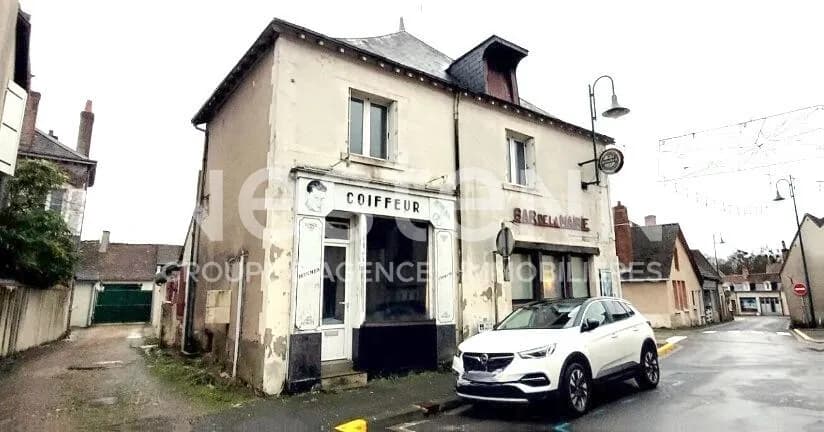 Immeuble mixte commerce / habitation - Centre-ville et 2 garages - Photo 1