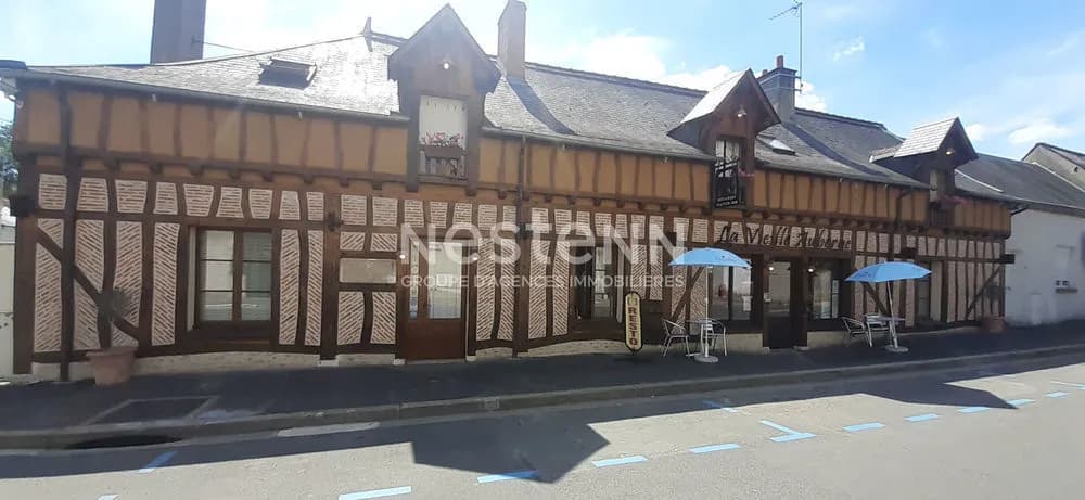 immeuble de centre-ville avec local commercial et logements locatifs - Photo 1