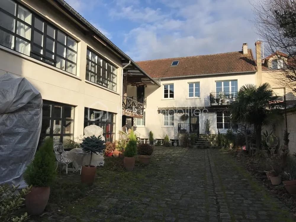 Bel ensemble immobilier de 4 appartements avec dépendances et places de stationnement - Photo 1