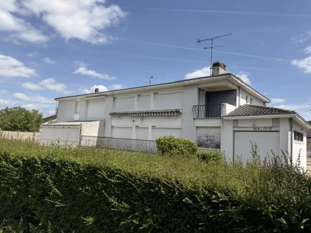 Ensemble immobilier avec habitation et local commercial - Photo 1