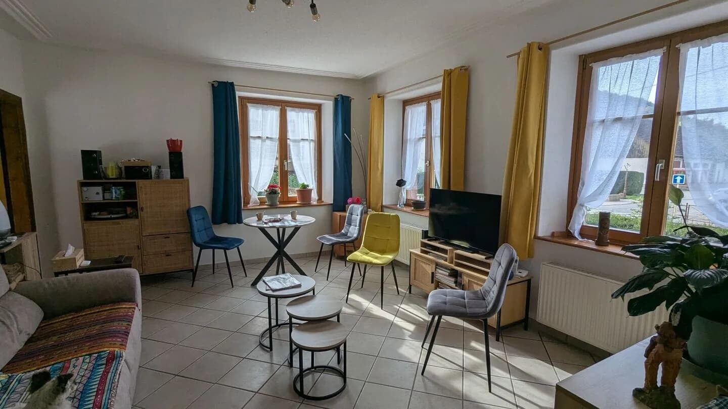 Pour investisseur : immeuble 2 appartements en location + 6 garages - Photo 1