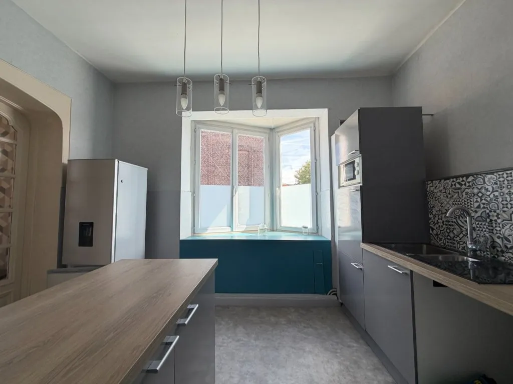 Immeuble de rapport comprenant un local commercial et un appartement - Photo 1