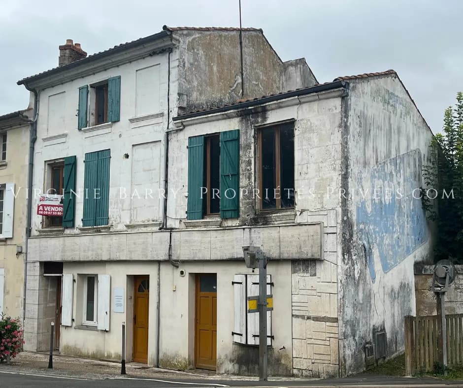 IMMEUBLE COMPOSE DE 4 APPARTEMENTS ET 1 MAISON AVEC JARDIN - Photo 1